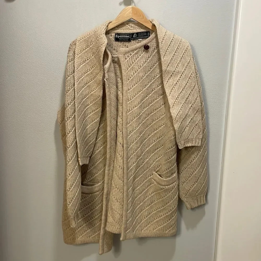 Spanner woman’s cream 100% percent wool sweater